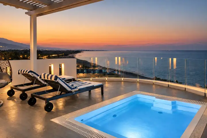 Infinity Suite with private heated pool, jacuzzi and sauna, sea view – private heated pool at sunset with sea and Mount Olympus view · Panorama Suites & Spa, Stomio